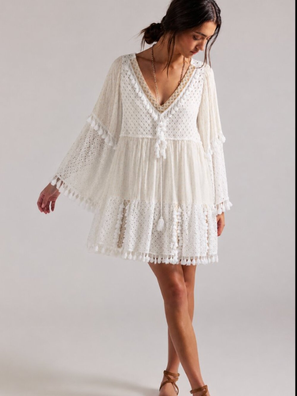 BOUTIQUE EYELET AND TASSLE TRIM DRESS
